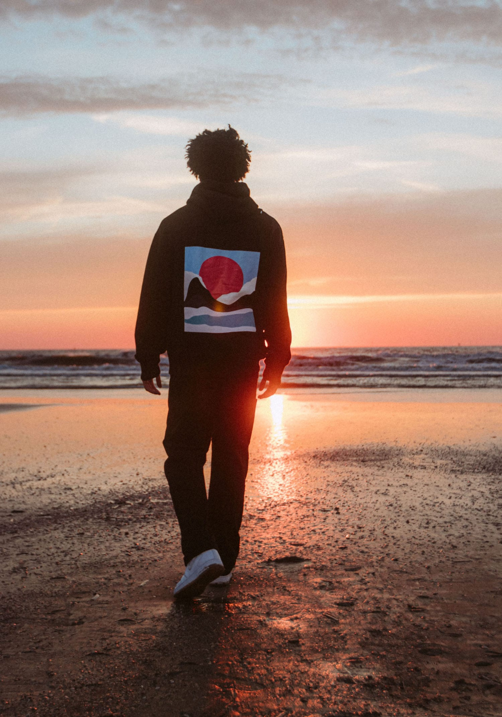 Model wearing a Rakata Black Hoodie