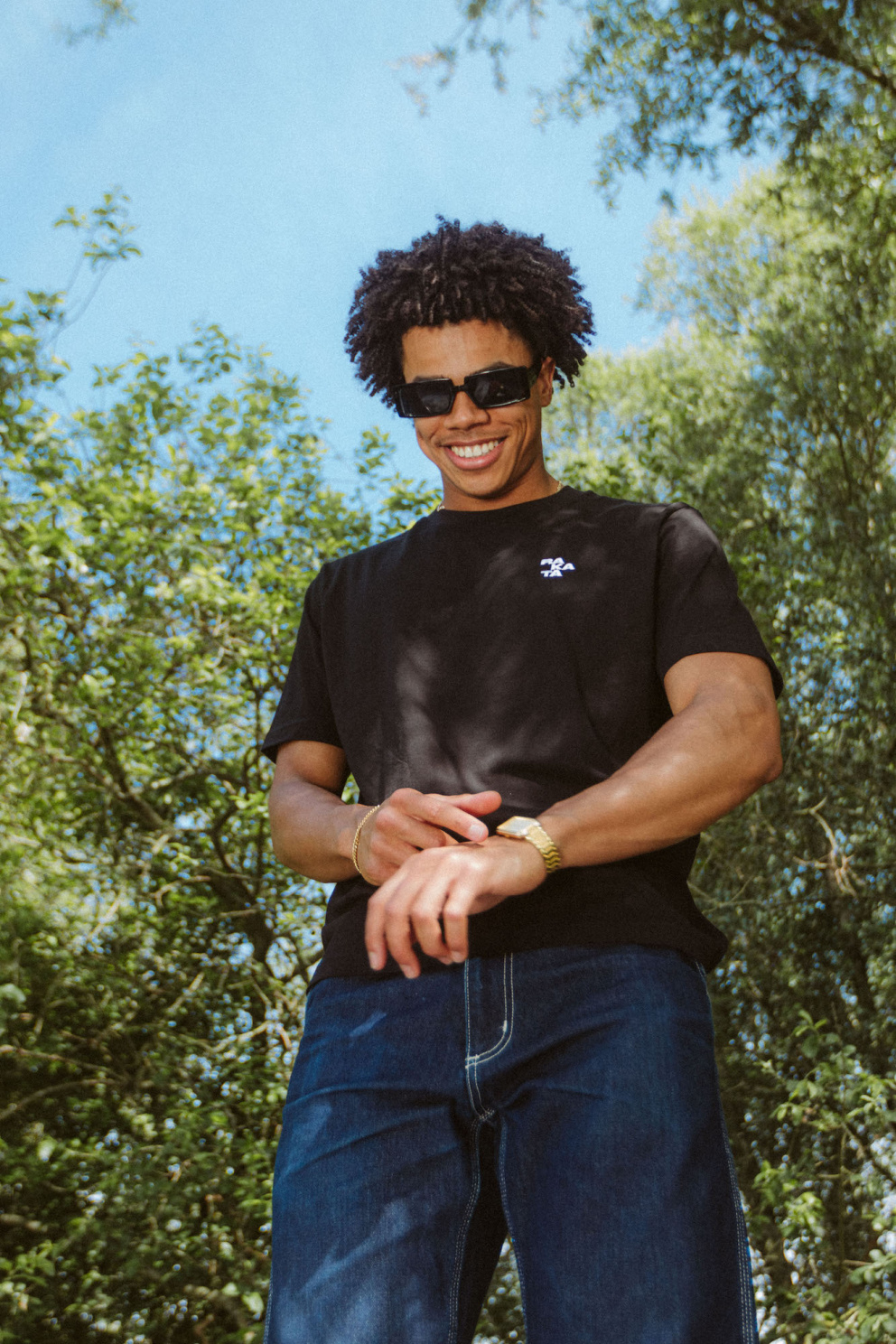 Model wearing a Rakata Black T-shirt